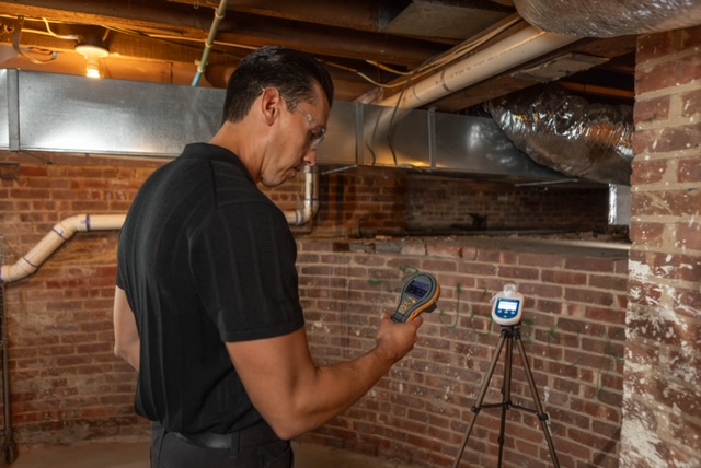 HB&H inspector documenting affected areas before remediation